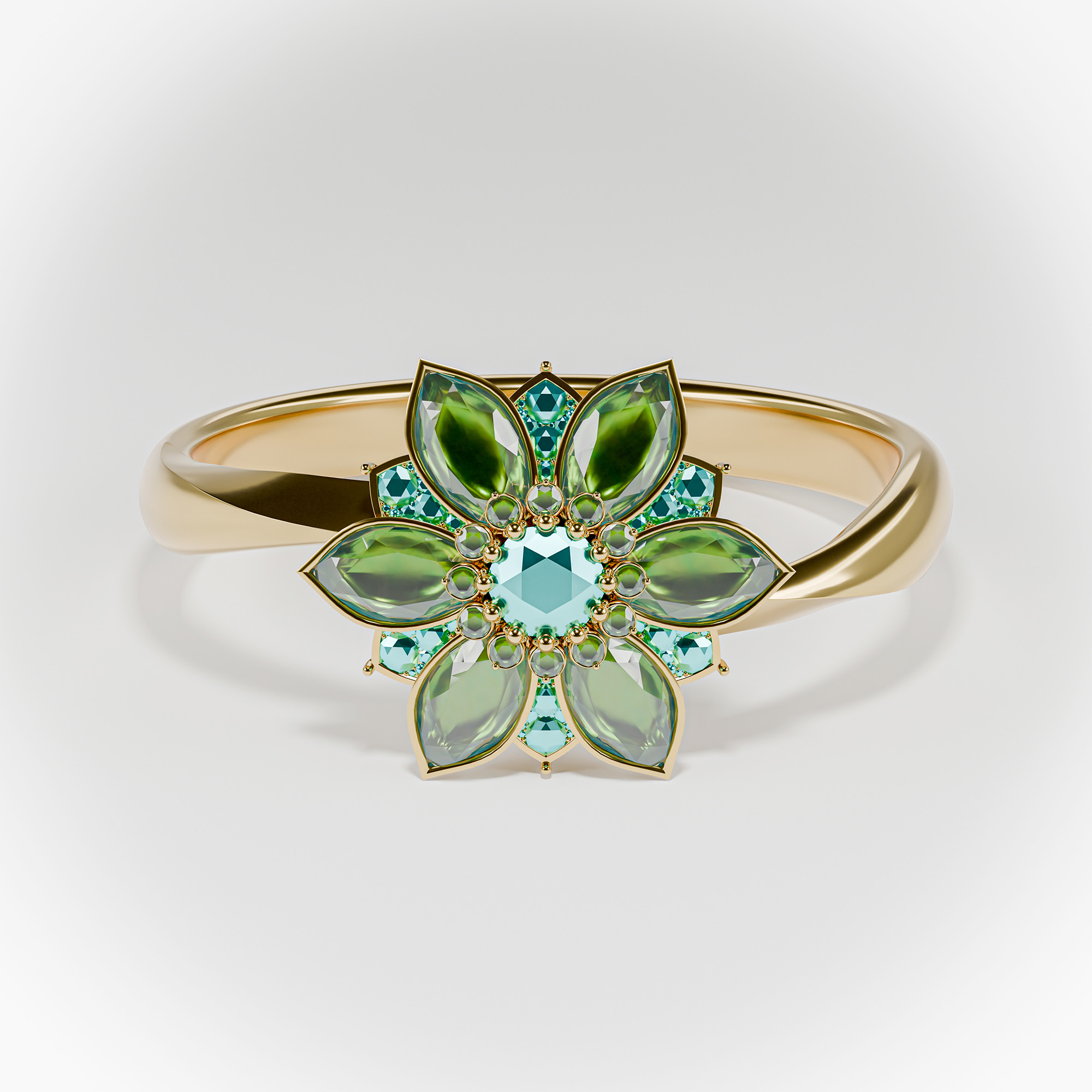 Direct front view of a gold flower ring with intricate emerald-green stone settings.